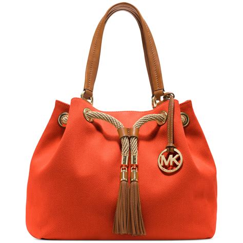 michael kors orange women's totes.